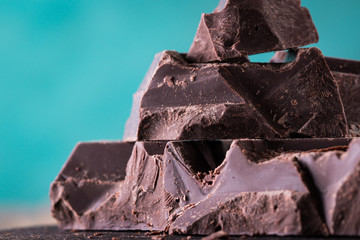 Dark chocolate stack, on wooden table,chocolate concept background