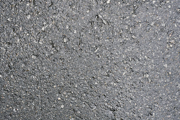 Background with a surface of wet asphalt 