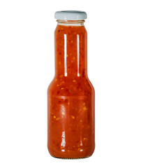Sauce from tomatoes and pepper in a glass bottle with a white cover isolated on white