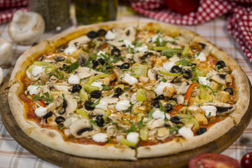Italian pizza with mushrooms, cheese and olives. Classical Italian pizza.
