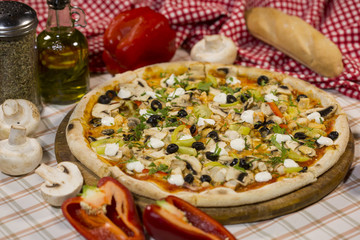 Italian pizza with mushrooms, cheese and olives. Classical Italian pizza.