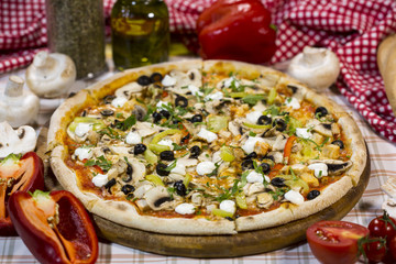 Italian pizza with mushrooms, cheese and olives. Classical Italian pizza.