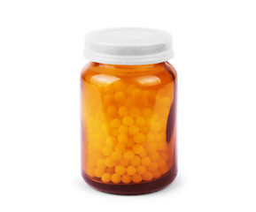 Transparent plastic bottle of vitamin  pills, isolated on white