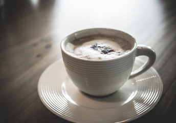 coffee cup on table in coffee shop.