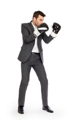 Fototapeta na wymiar Businessman in boxing gloves