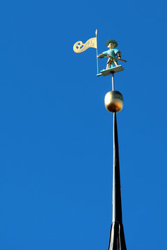 A weather vane figure of old warrior called Old Thomas, on top of the spire of Tallinn Town Hall in Tallinn, Estonia. The symbol of the city was first installed in 1530.
