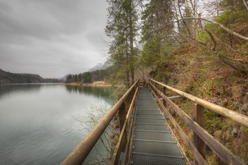 Obraz na płótnie Canvas Footbridge on the Lake Alpsee
