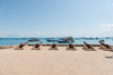 waterfront of Stone Town with cannons in Zanzibar