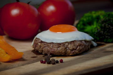 Steak with egg in the restaurant