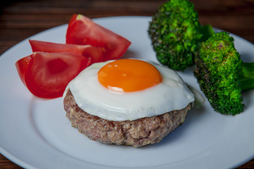 Steak with egg in the restaurant