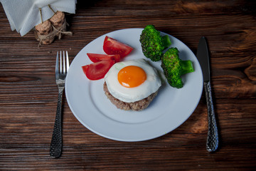 Steak with egg in the restaurant