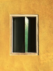 Architecture in Venice - Green Window in a yellow wall (Venice, Italy)