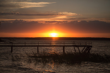 Fototapeta na wymiar Wooden pier at sunset