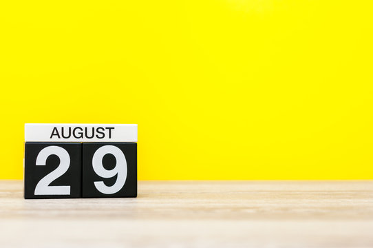 August 29th. Image of august 29, calendar on yellow background with empty space for text. Summer time