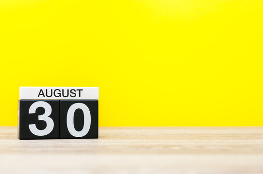August 30th. Image of august 30, calendar on yellow background with empty space for text. Summer time