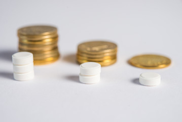 Pills and money closeup