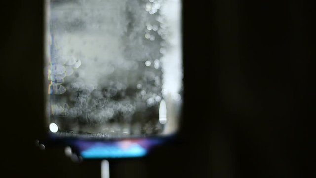 Boiling water in a transparent glass