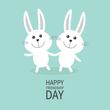 Happy Friendship Day. Two white bunny rabbit couple set Holding hands Cute cartoon smiling character. Happy emotion. Friends forever. Baby greeting card. Green background. Flat design