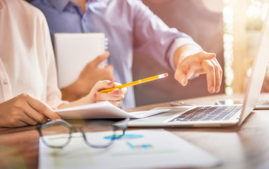 man and woman working in the office