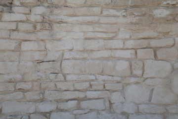 Rough cut stone wall seamless texture background