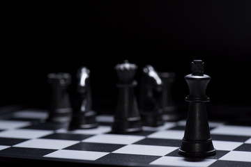 Black chess pieces lost to white chess pieces