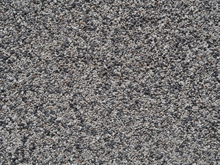 facade plasture from grit structure - white grey beige background