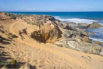 Fototapeta na wymiar Trail over the cliffs in Vila Nova de Milfontes