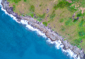 Sea aerial view,Top view,amazing nature background.The color of the water and beautifully bright.Azure beach with rocky mountains and clear water of Thailand ocean at sunny day.