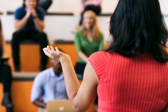 Workspace: Businesswoman Talking To Crowd