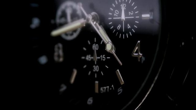 Mens Watch made metal with sapphire glass. Macro video. Time is running out. Close-up of watch with metal  arrows
