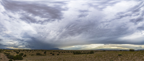 panorama of a giant storm in the southwest desert