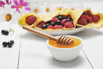 Pancake - Crepes with berries and honey