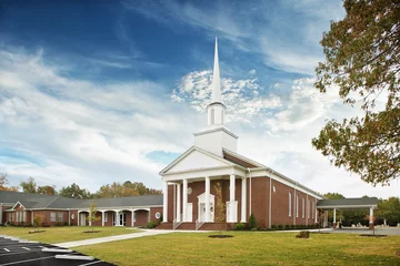 Foto op Canvas White and Brown Baptist Church Exterior with White Steeple tower, religion, God, Priest © Brian