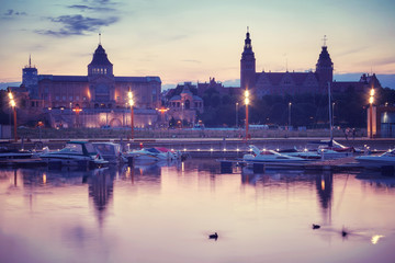 Fototapeta premium Vintage toned Szczecin waterfront with marina and Chrobry Embankment at sunset, Poland.