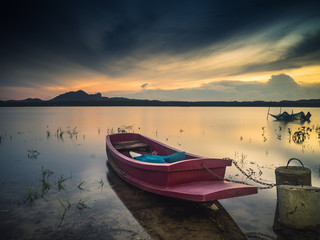 Fototapeta na wymiar A boat after sunset