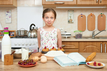 Girl baking cookies. Home kitchen interior. Healthy food concept