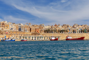 Fototapeta na wymiar Valletta. The old harbor and port.