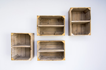 Contemporary shelves made of wooden vegetable boxes