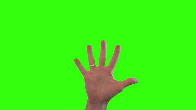 Hands Counting Till Ten On Green screen. Male hands on a green screen counting numbers until ten