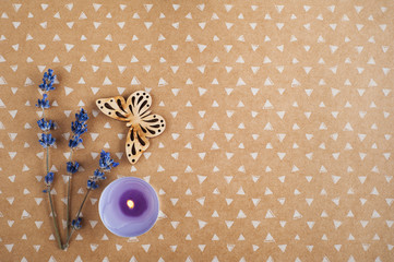 Lavender flowers, purple candle, butterfly