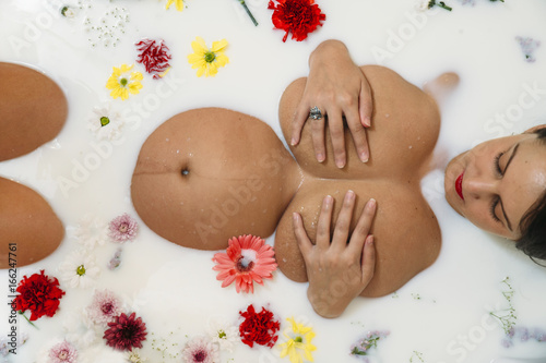Pregnant Woman S Body In Floral Milk Bath Stock Photo And