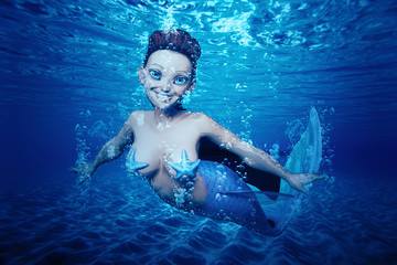 mermaid cartoon under the sea
