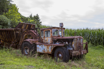 Fototapeta premium Rusting farm truck in field