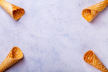 Waffle ice cream cone on a light background