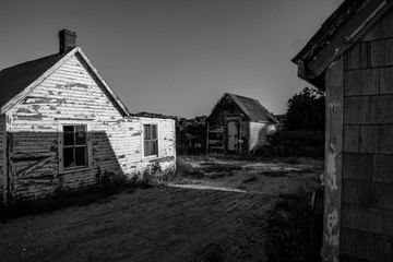 old shacks and a dirt road