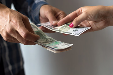 hands with banknotes. currency exchange dollar to ruble.