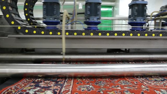 Automatic washing and cleaning of carpets. Industrial line for washing carpets 
