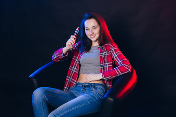  Woman smoking electronic cigarette with smoke