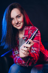  Woman smoking electronic cigarette with smoke