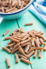 Dried rigatoni pasta.